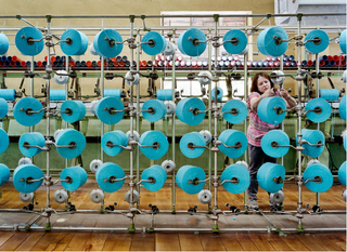 Illustration for article titled Inside the Colorful Chaos of America's Aging Textile Mills